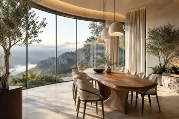 Luxury listening lounge with a floating acoustic canopy, curved sofas, walnut storage, pale stone flooring, and warm ambient lighting.
